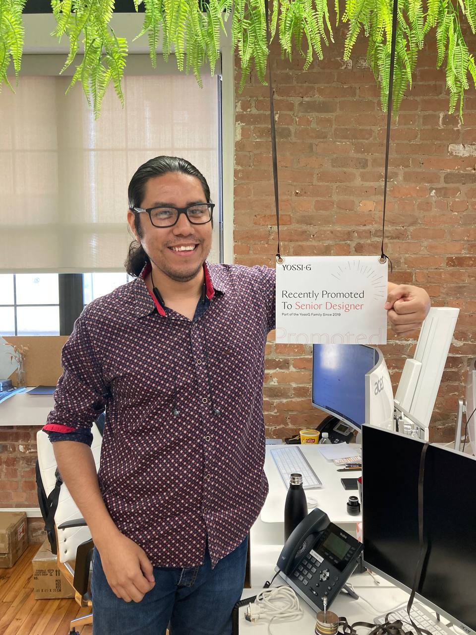 Our designer, Juan, was celebrated with a sign when promoted to Senior Designer. 