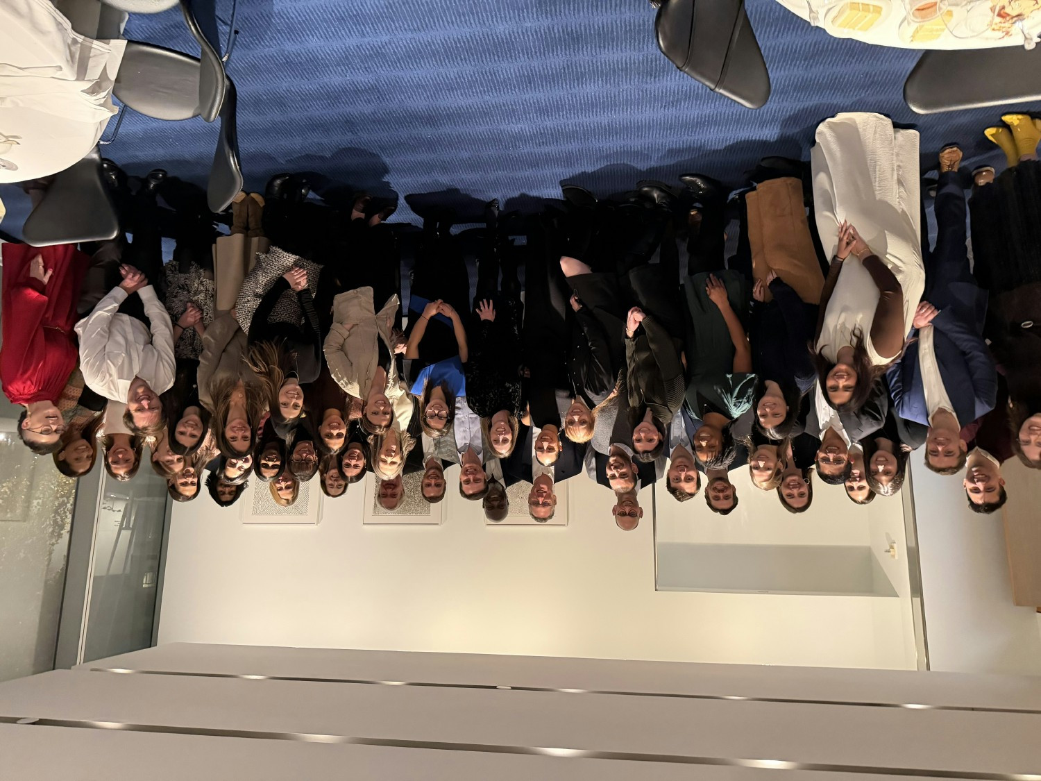 The O.W. team at its annual holiday party in 2025, hosted by O.W. Founder, Pete Stavros, and his wife, Lindsay Stavros 