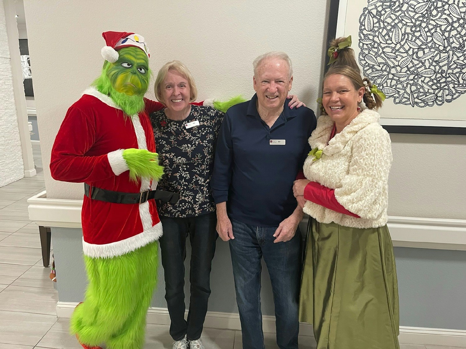 Cindy Lou and the Grinch paid a visit! Definitely not our Marketing Director and Accountant!