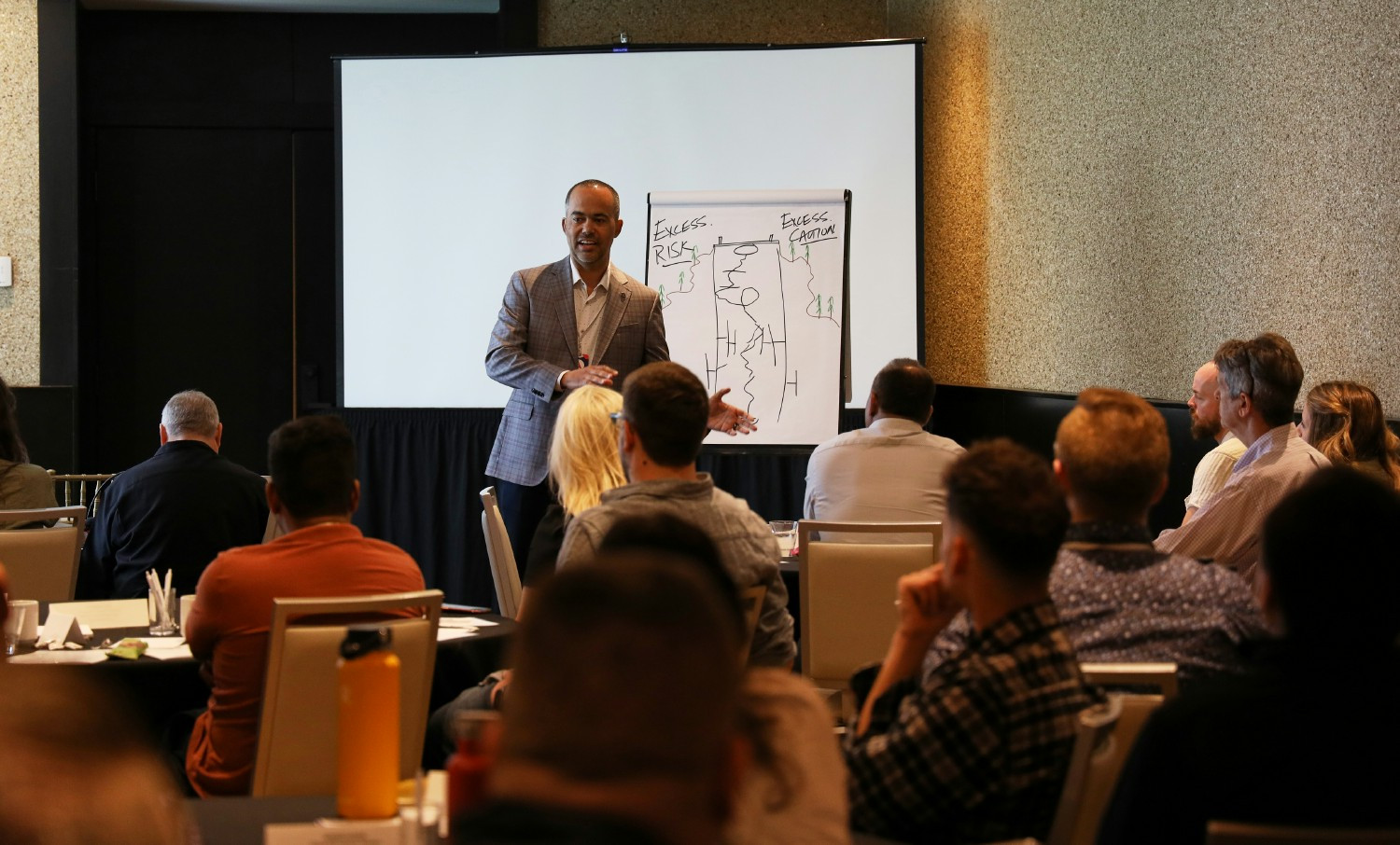 Artisan CEO, Tim Mitrovich, addressing the Artisan team during a group session.