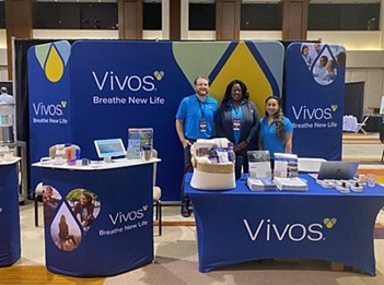 Vivos team members attending a conference.
