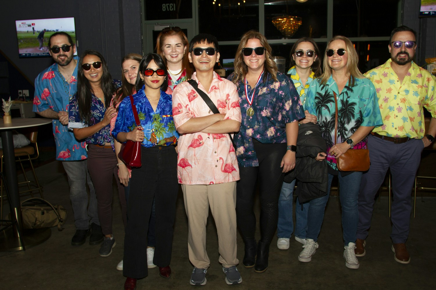 Our Marketing team surprised everyone at a company event wearing Hawaiian shirts!