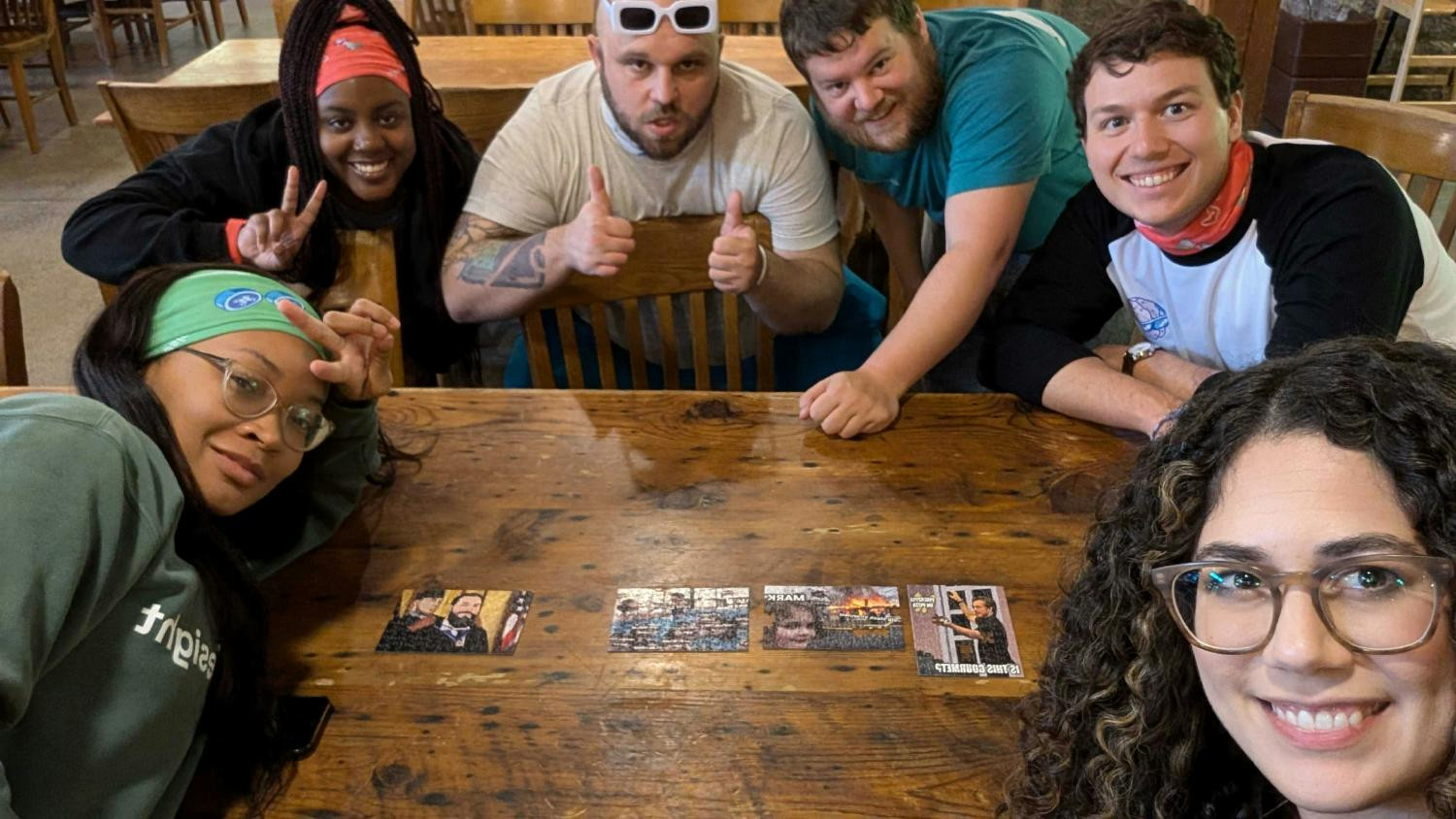 Gamesight team members complete Gamesight meme puzzles during an all-company retreat. 