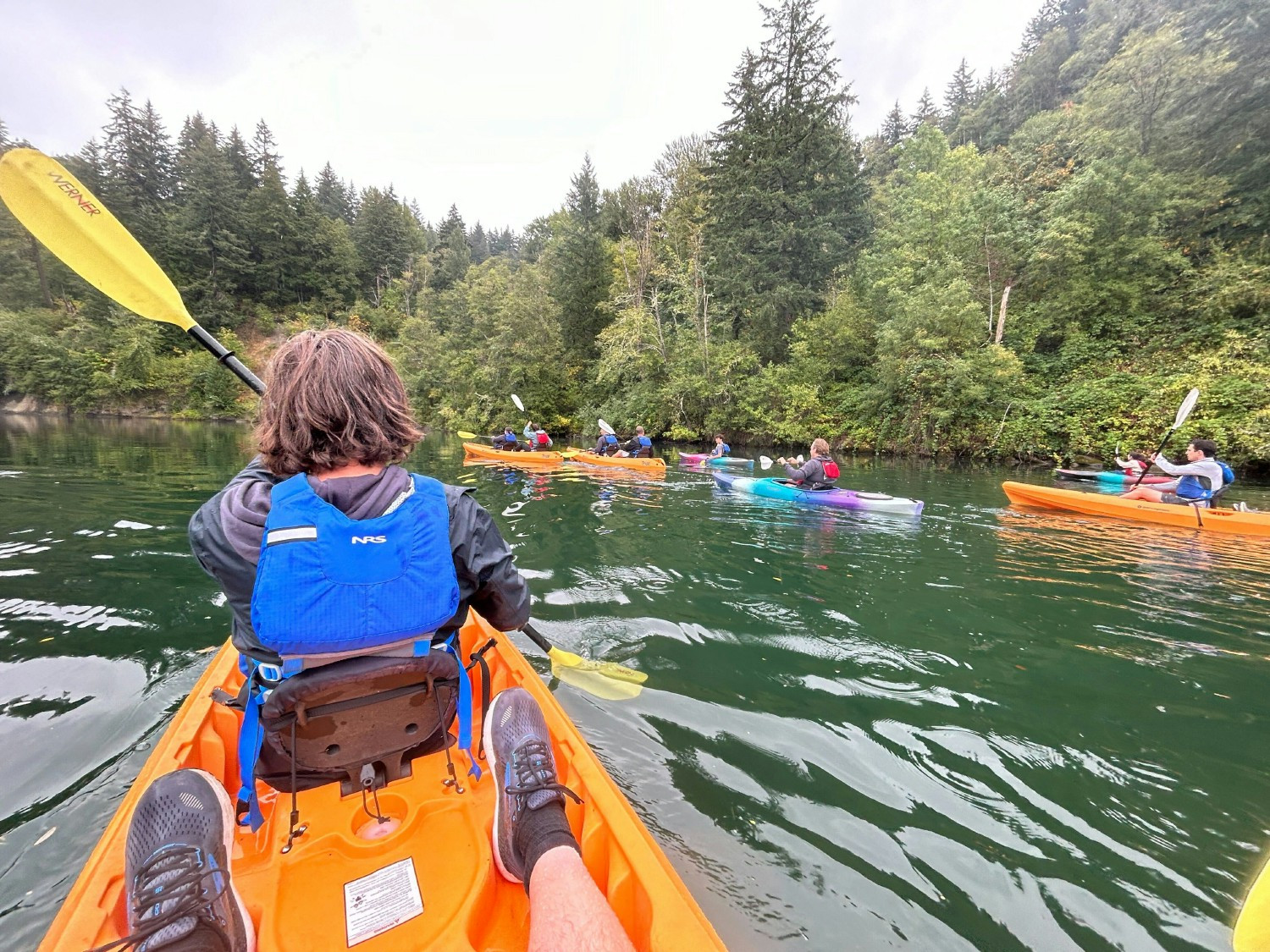 Employees enjoy a peaceful morning kayak during our company retreat. 