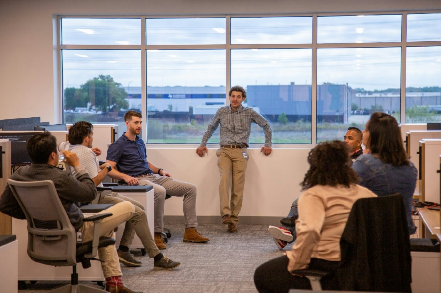 Allied Electronics & Automation employees hosting one of their first meetings in the new hybrid office 