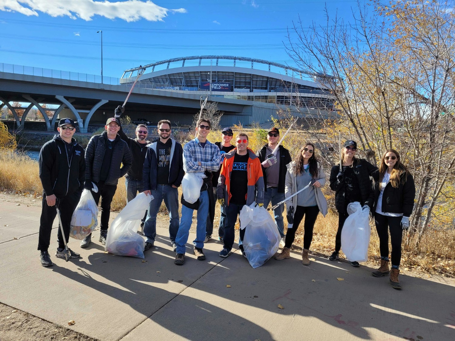 Members of the Fluid Truck team volunteer to clean up across downtown Denver.
