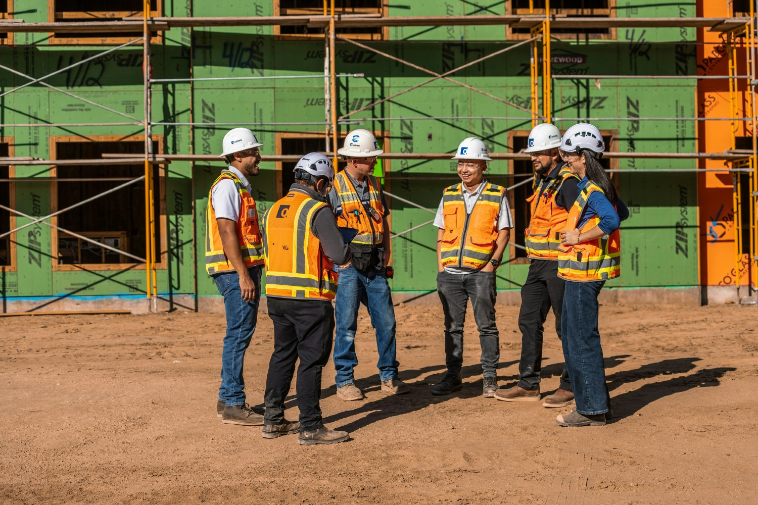 Jobsite Collaboration - Project team members gather on site for a walk-through