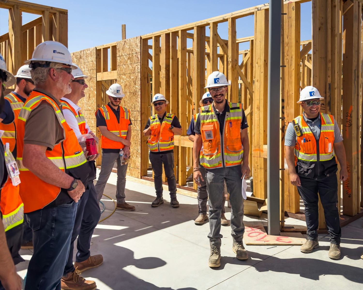 Sites & Bites - Team members gather during a project site visit to walk the job and learn from the project team