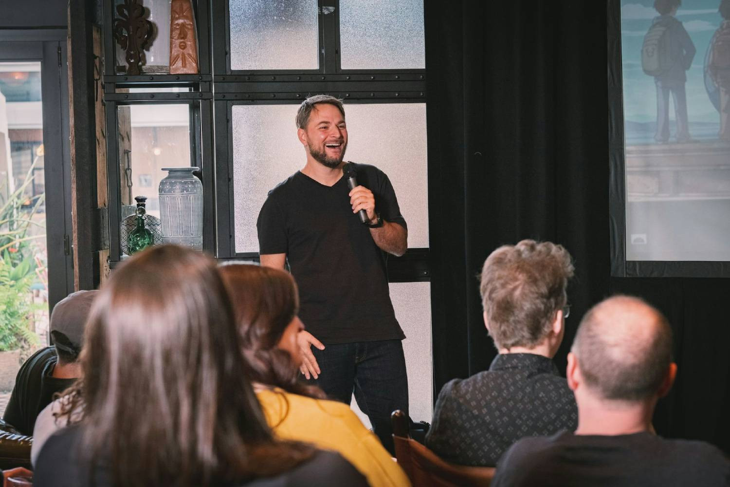 CEO Marc Minor leads presentations during a team meeting