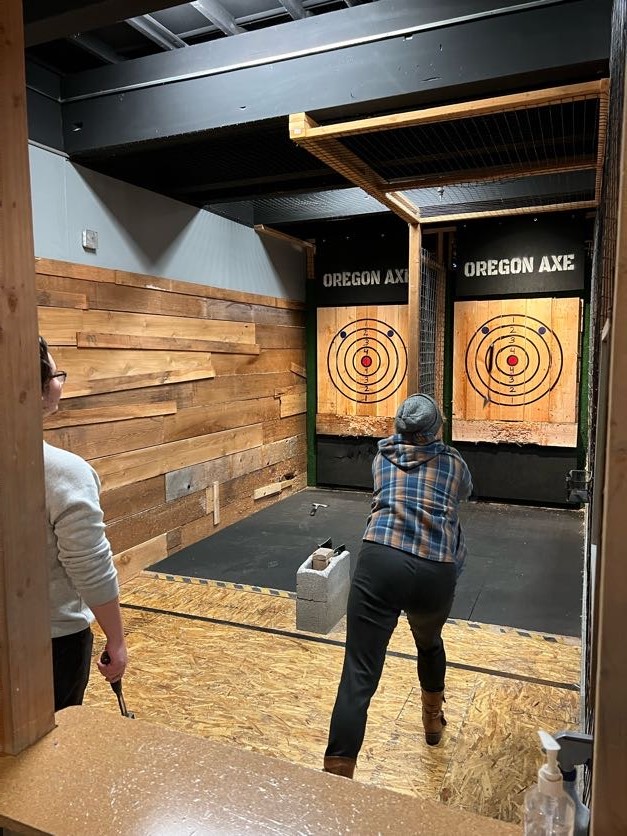 Team members let off steam during an ax-throwing session as part of our annual Team Goals retreat.