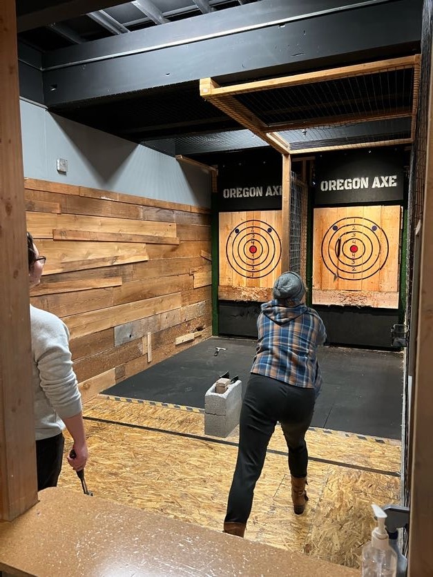 Team members let off steam during an ax-throwing session as part of our annual Team Goals retreat.
