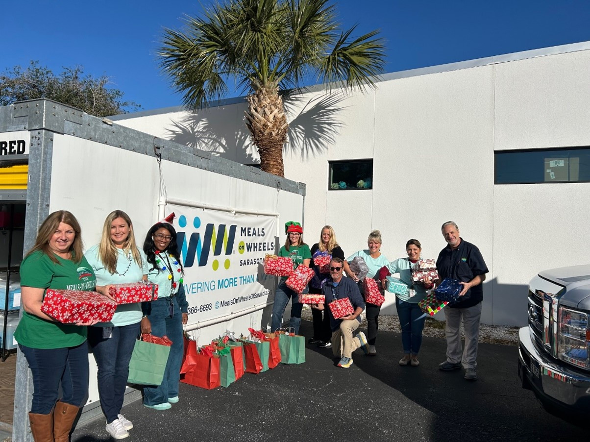 Community Outreach Committee delivers gift bags to Meals on Wheels for seniors in Sarasota.
