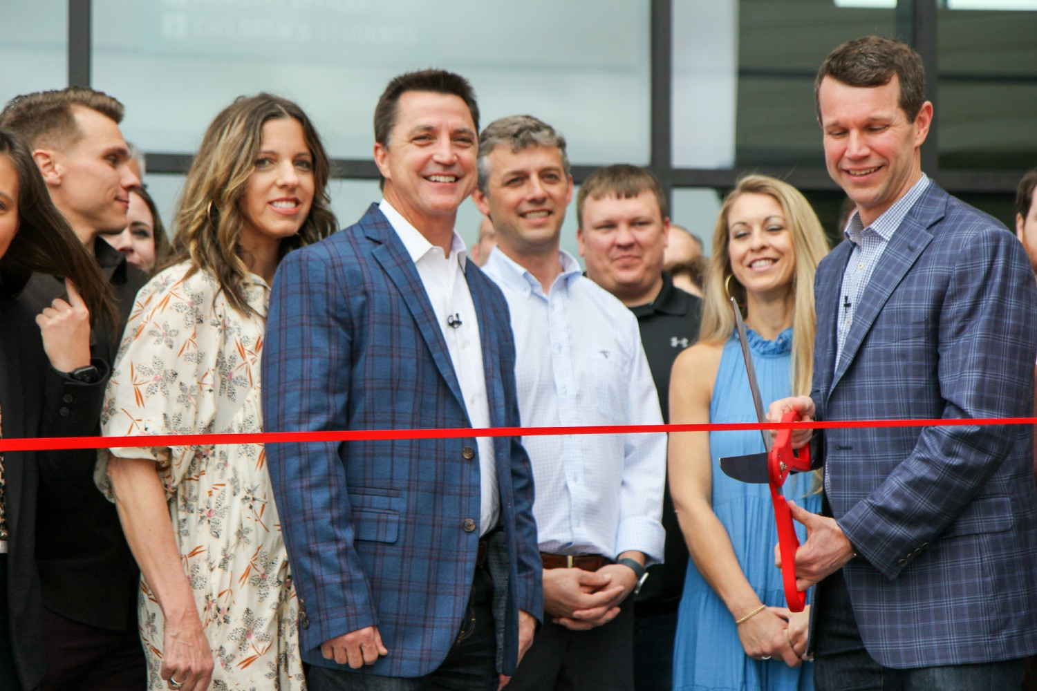 Ribbon cutting with owners and ICM team for recently completed project