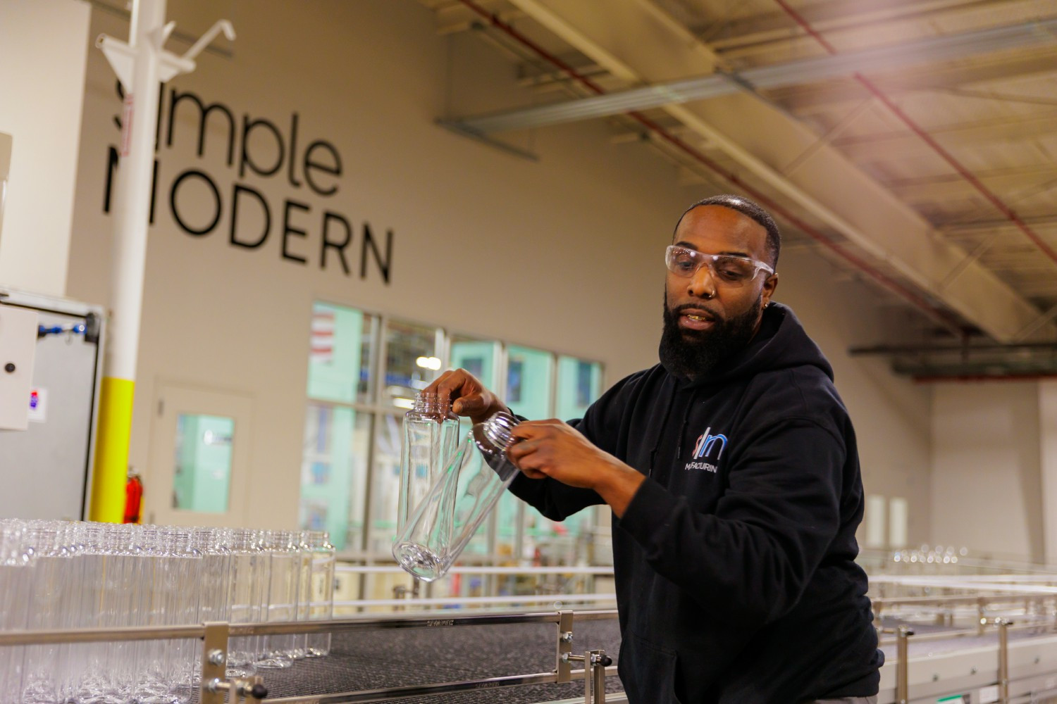 A Simple Modern employee works at the company's manufacturing facility in Oklahoma. 