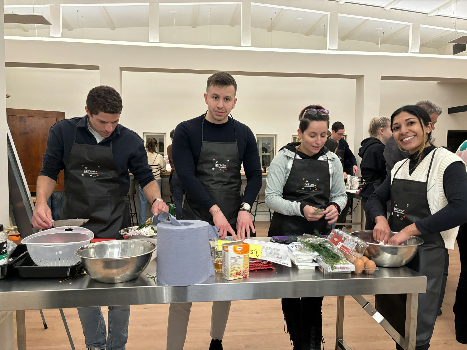 The Amsterdam office at a team get-together and cooking class