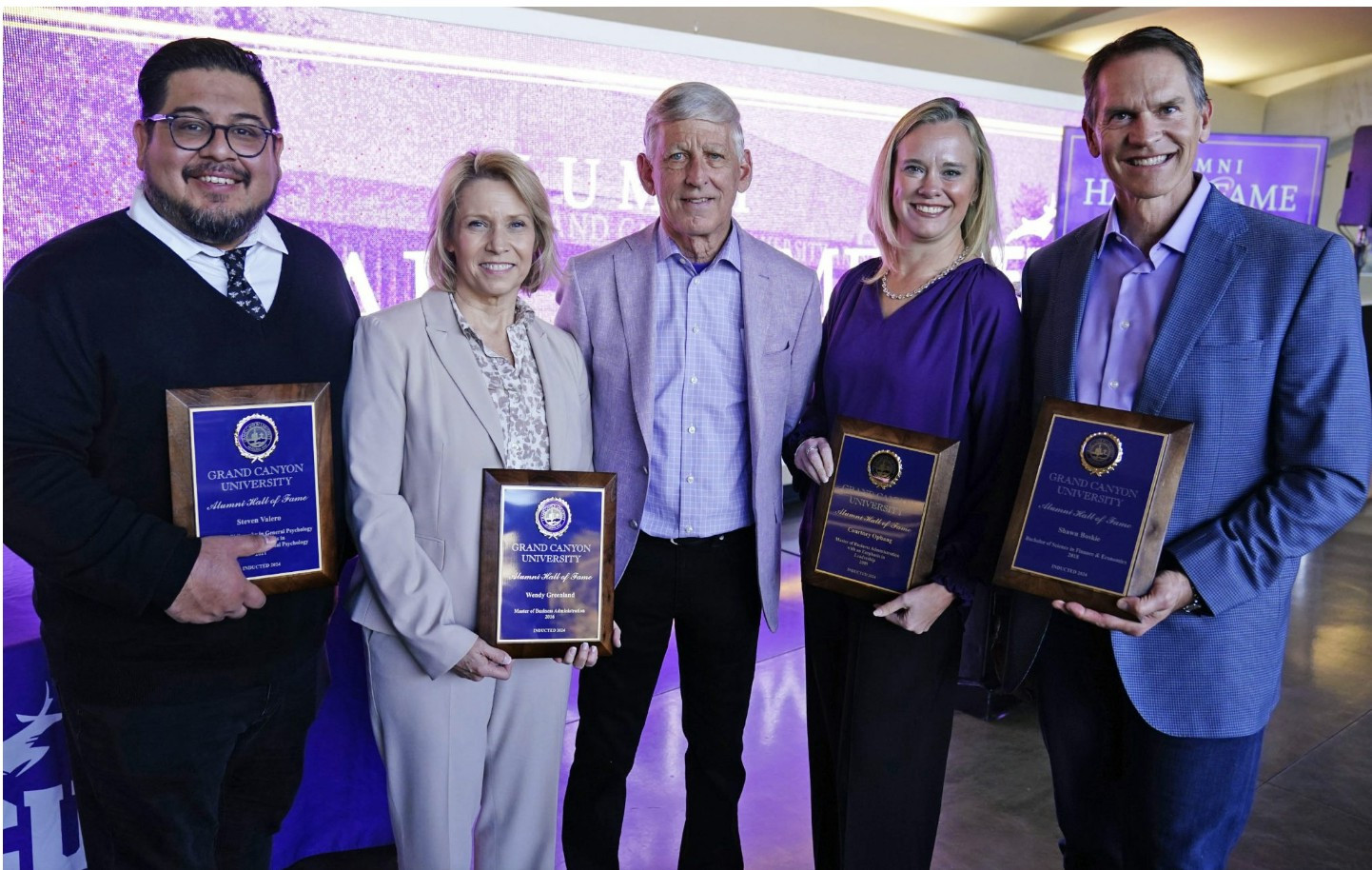 CEO Wendy Greenland being accepted into the GCU Alumni Hall of Fame.