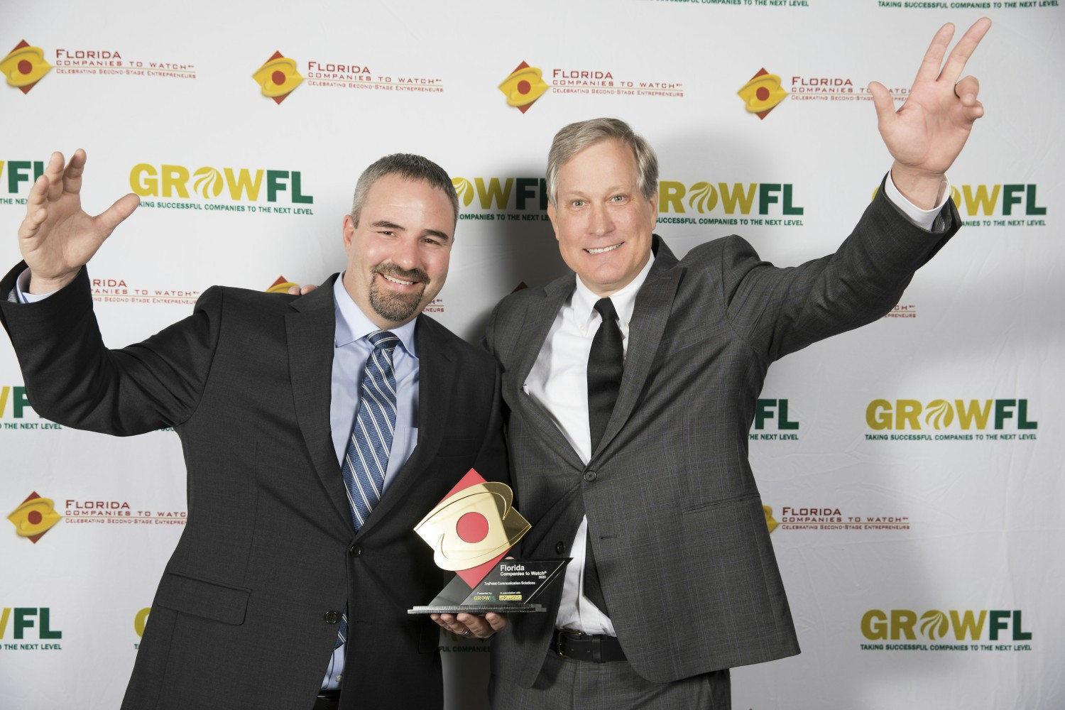 TruPoint President accepting the award as one of the Top 50 Companies in the State of Florida to Watch.