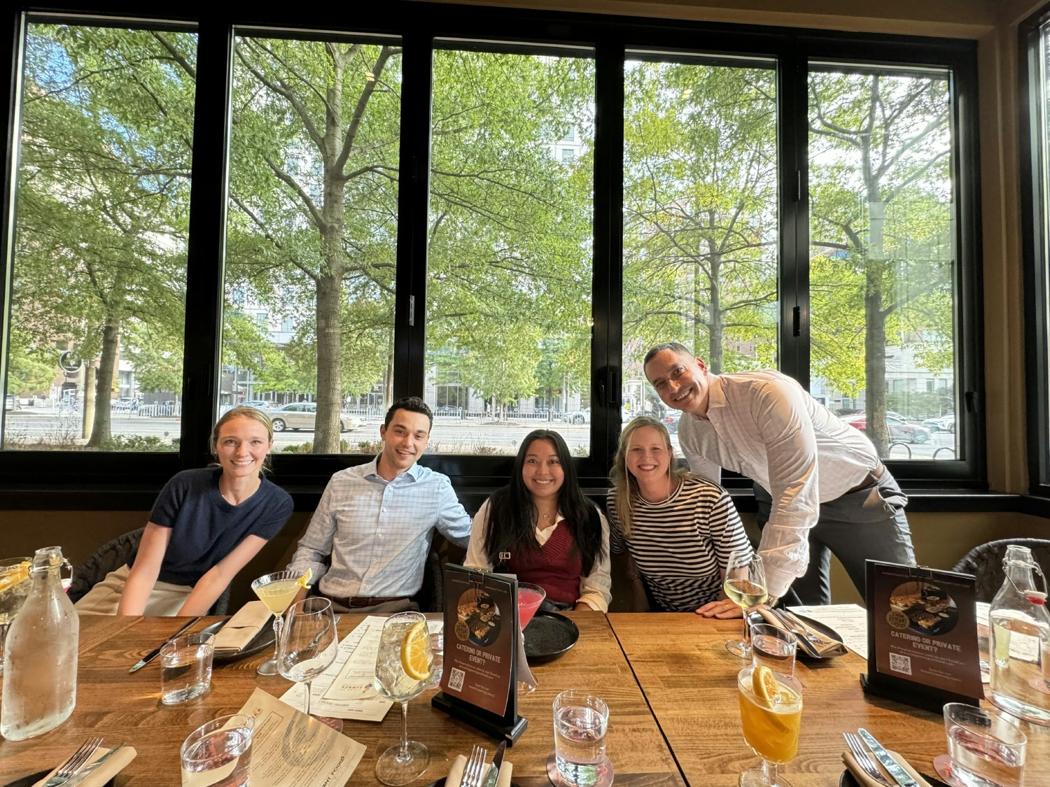 Team members enjoying dinner after a company in-office day. 