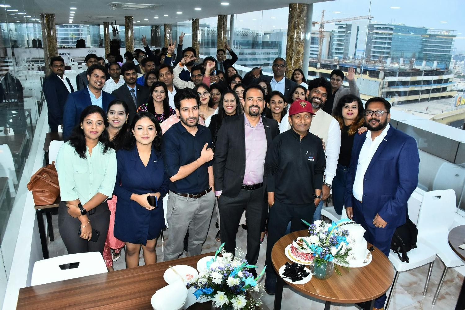 Recruitment team with CEO to celebrate new office inauguration.
