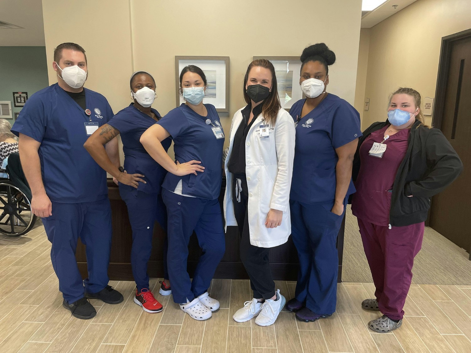 Our clinical regional manager, Christina Gibson (white coat), with friends at a skilled nursing facility !