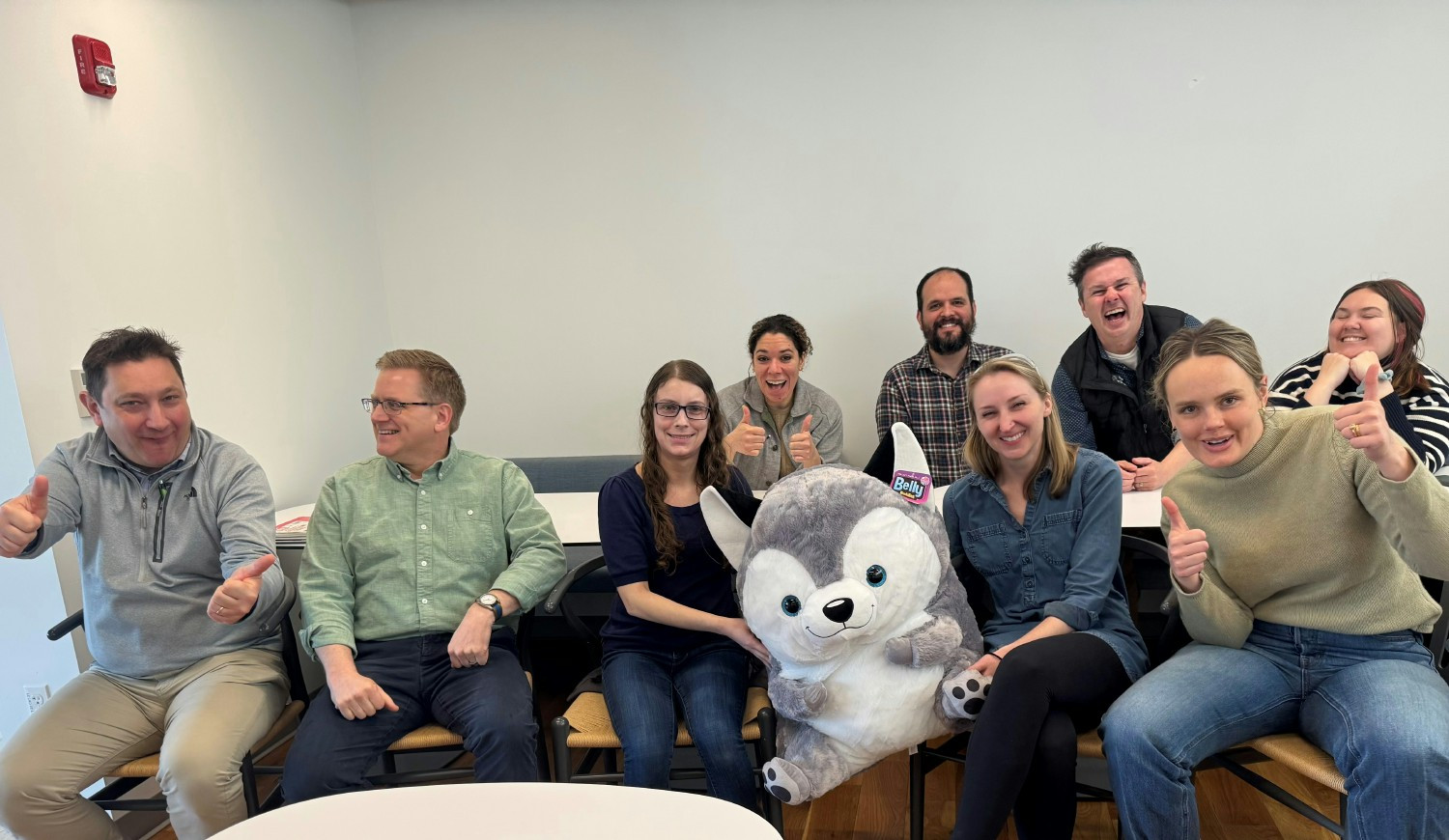 AFFOA team members sharing a laugh with newly adopted Chucky Chinchusky mascot.