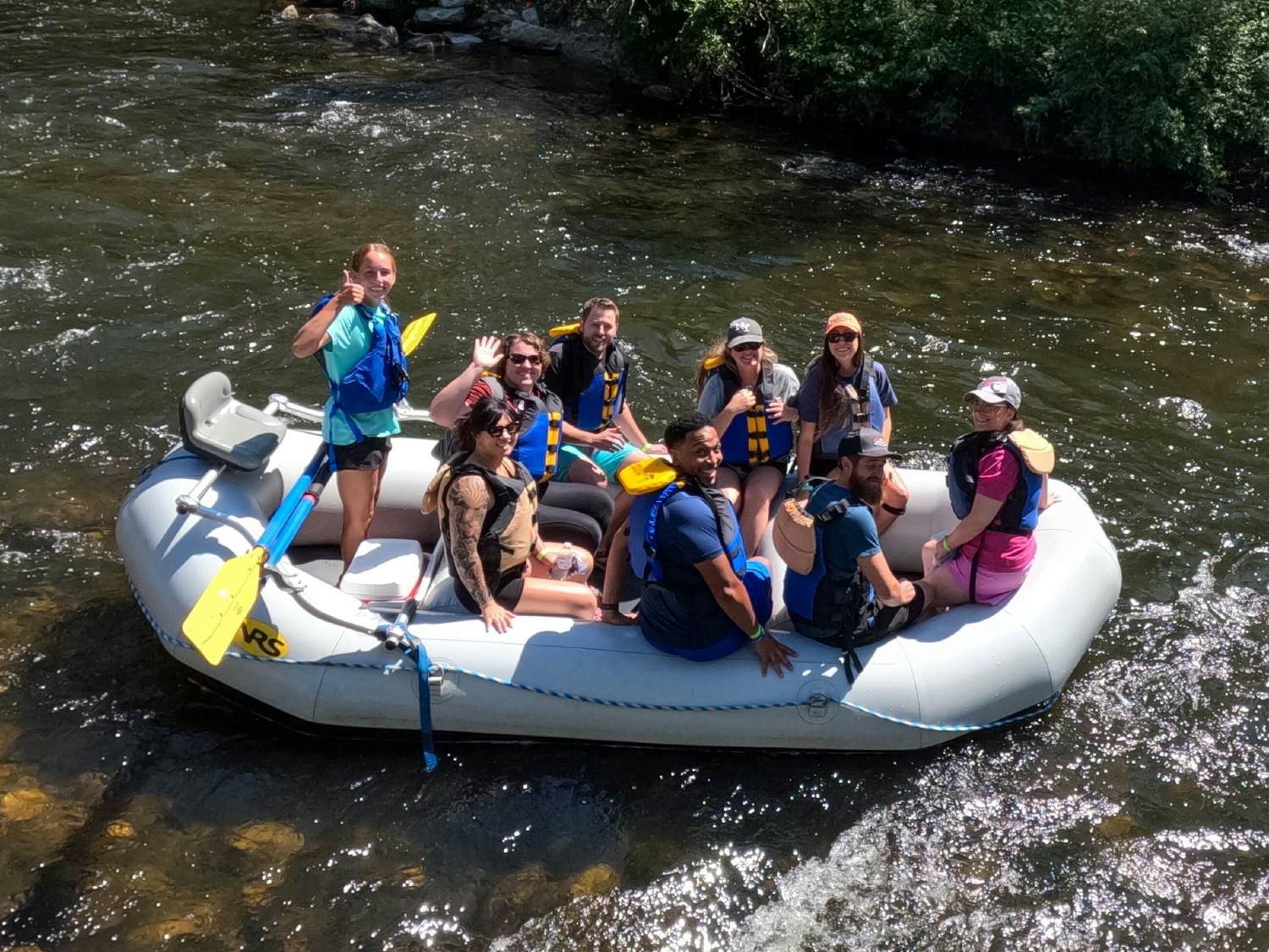 Our Marketing team having an amazing time whitewater rafting during their team day at the 2023 August Company Onsite.