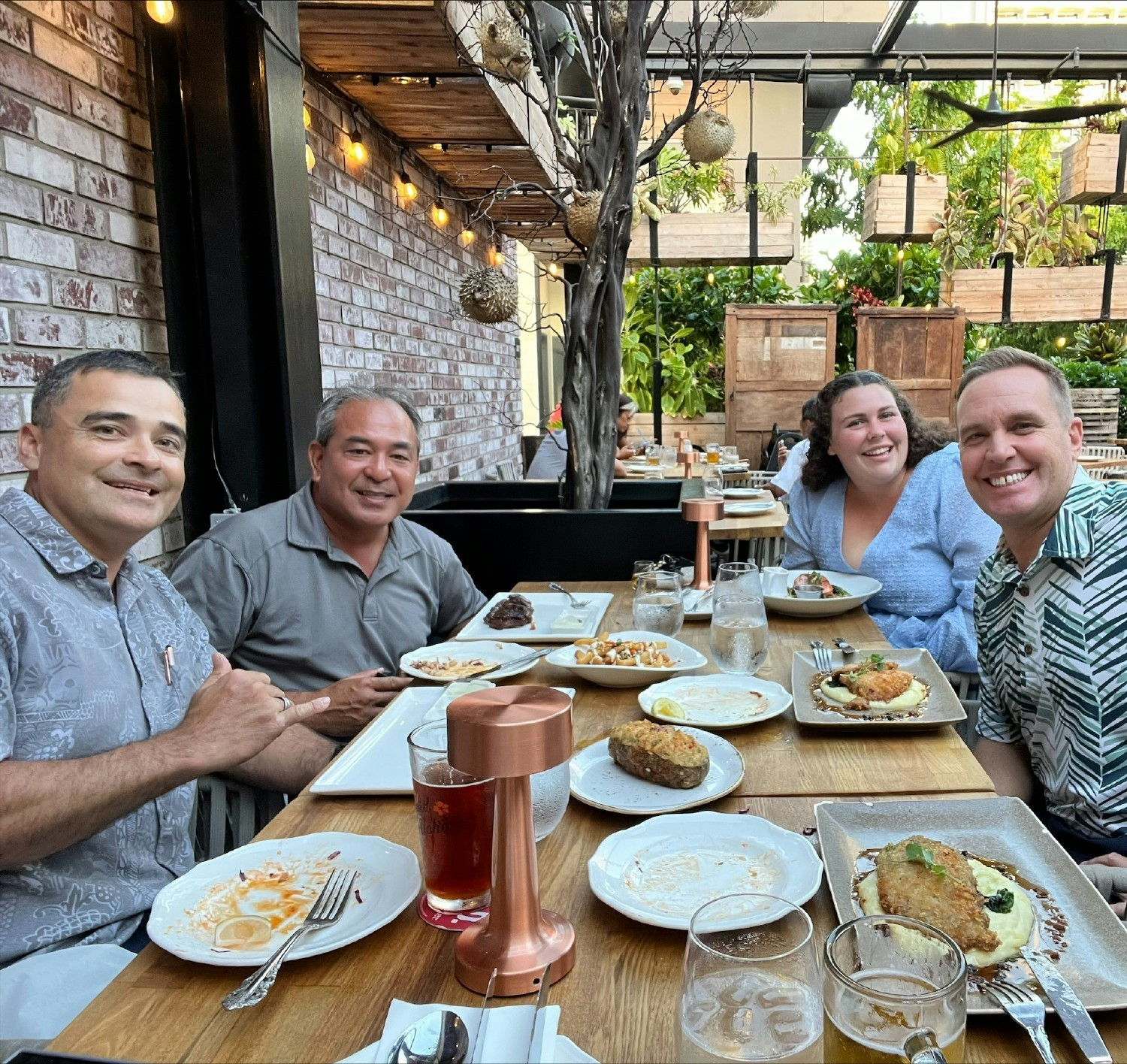 Hawaii team enjoying a delightful dinner together.