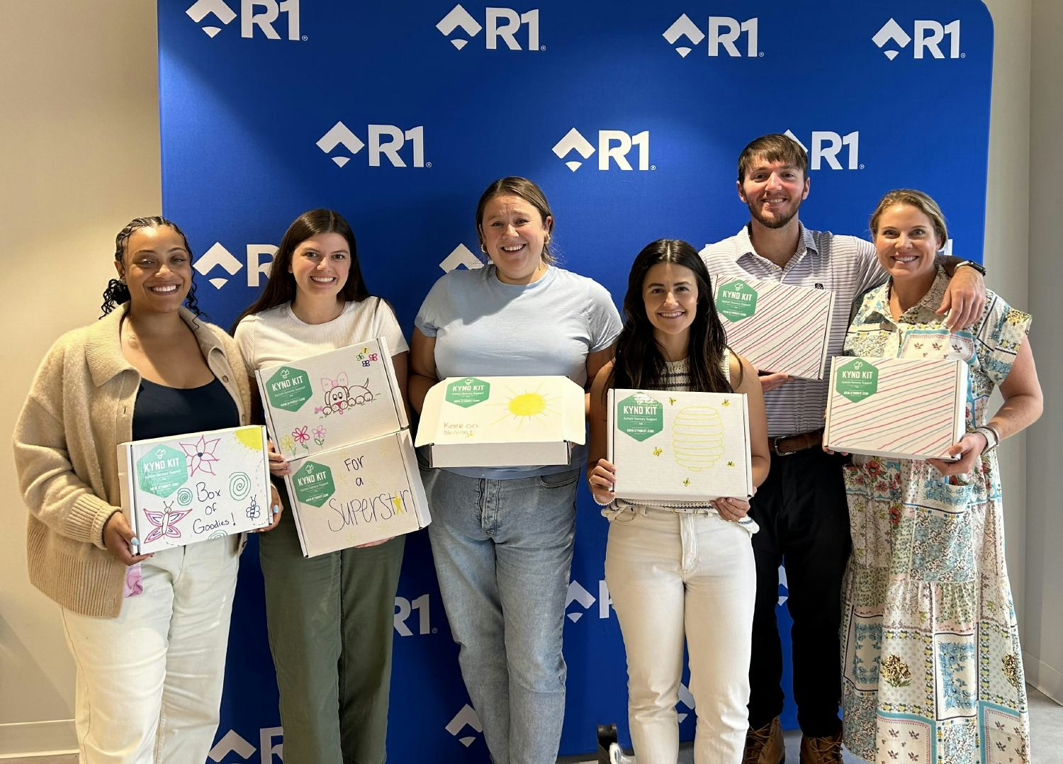 R1 Associates participating in a Helping Hands activity that gives back to our local communities.
