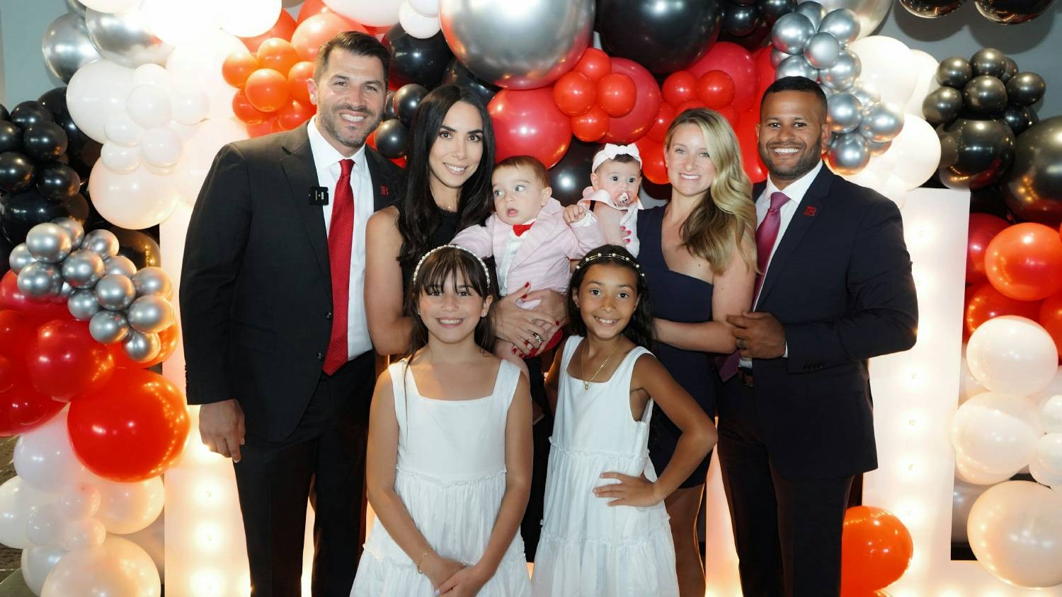 Owners with family at grand-opening