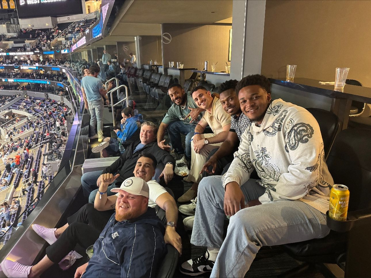Enjoying a Sweet 16 game at the Crypto.com Arena suite with a great group of advisors.