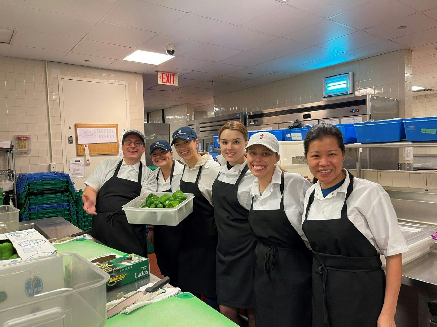 American Securities colleagues volunteering at ReThink Food during a Giving Back Day. 