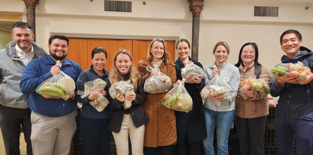 American Securities colleagues volunteering at ReThink Food during a Giving Back Day. 