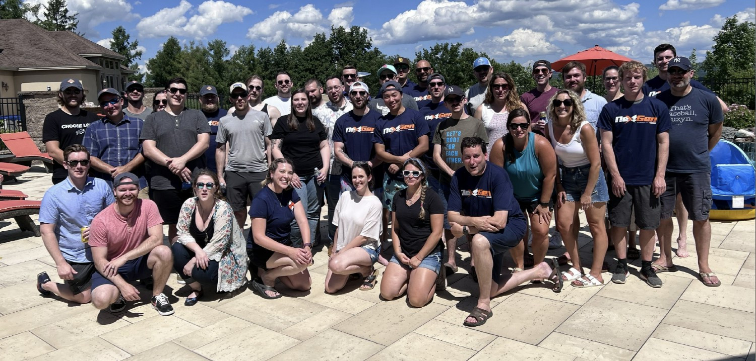 Team photo of SIDEARM Sports in their Syracuse office.
