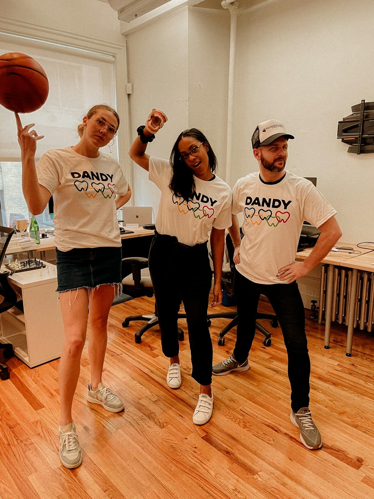 Dandians posing with their Dandylympics tee