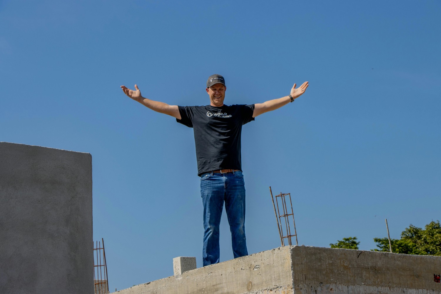 Seth (CEO) standing on top of one of the houses we paid to have built and donated in Mexico.
