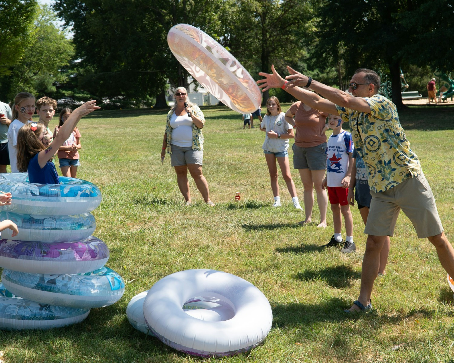 Summer picnic games with AVIAN teammates and their families.