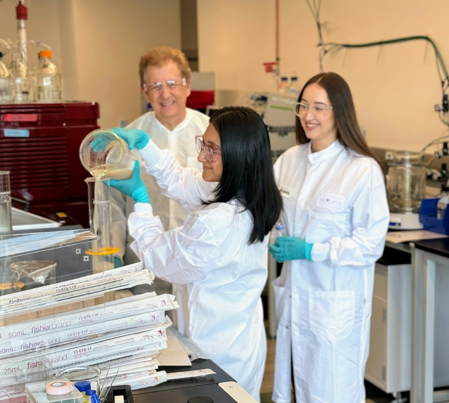 Employees collaborate on a project at Vaxcyte headquarters in San Carlos, CA.