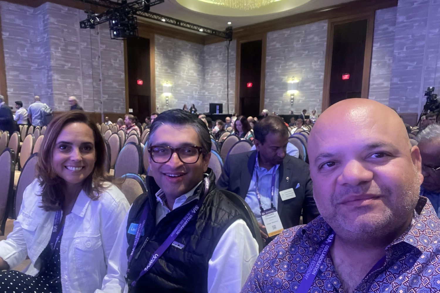 Co-Founders Kazi Ahmed & Dave Singh, attending industry conference with SVP of Sales & Strategic Accounts Delia DeVere.