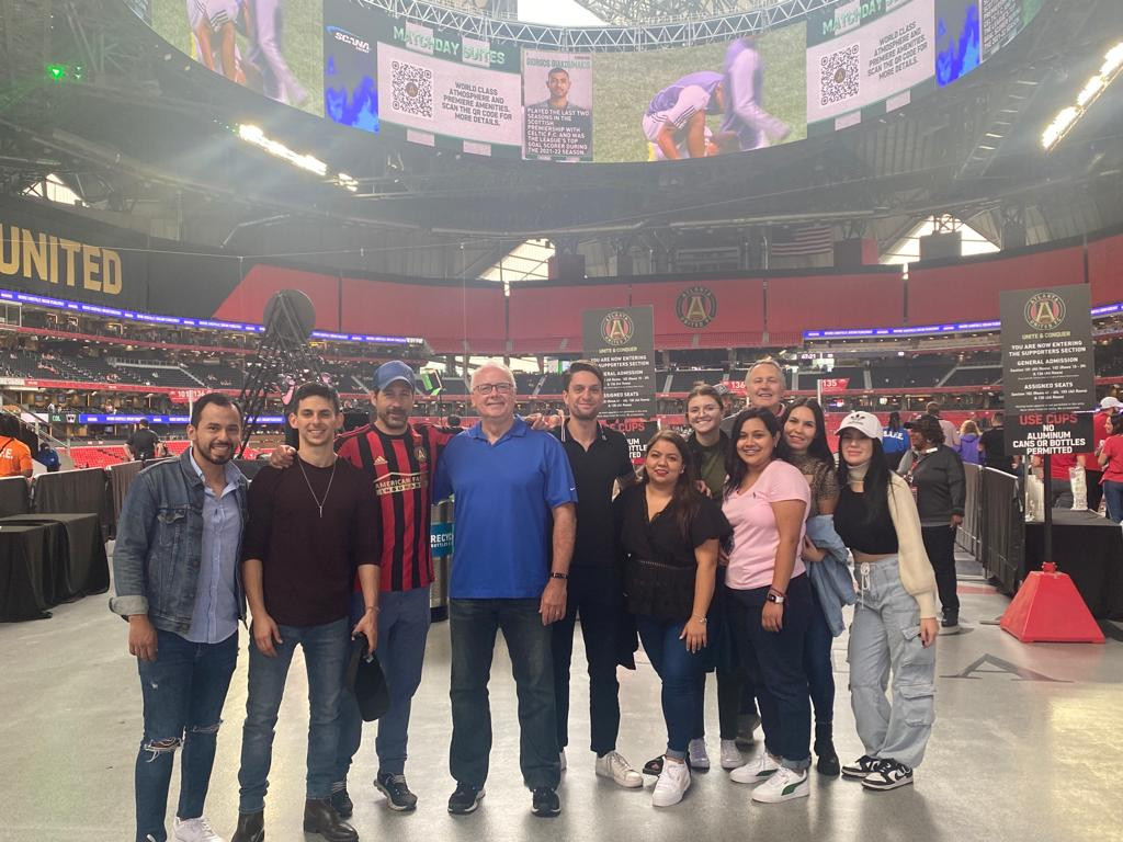 Team members attending soccer game