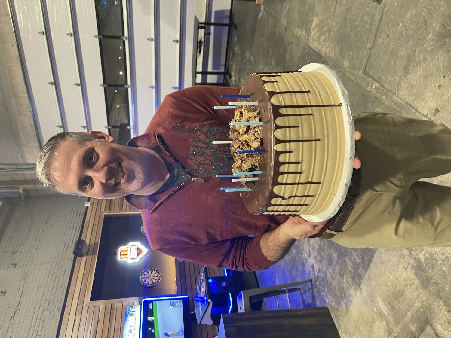 Pat Thornton, one of Sixmo's founders, enjoying his birthday cake.
