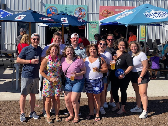 Sales teams donated surf boards to a non-profit that promotes surf therapy to physically and mentally wounded veterans.