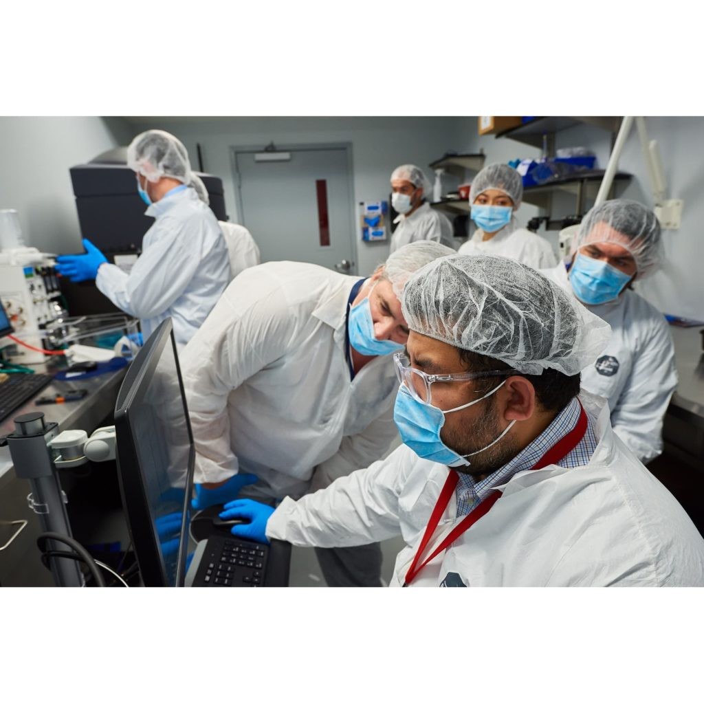 Scientists collaborating in the MMRI laboratory.