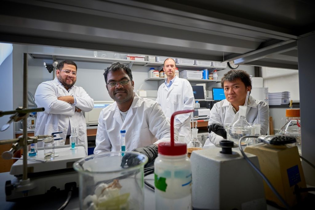 Dr. Chase Kessinger, Dr. Muthunarayanan Muthiah, Dr. Jason McCarthy and Dr. Khanh Ha in the MMRI laboratory.