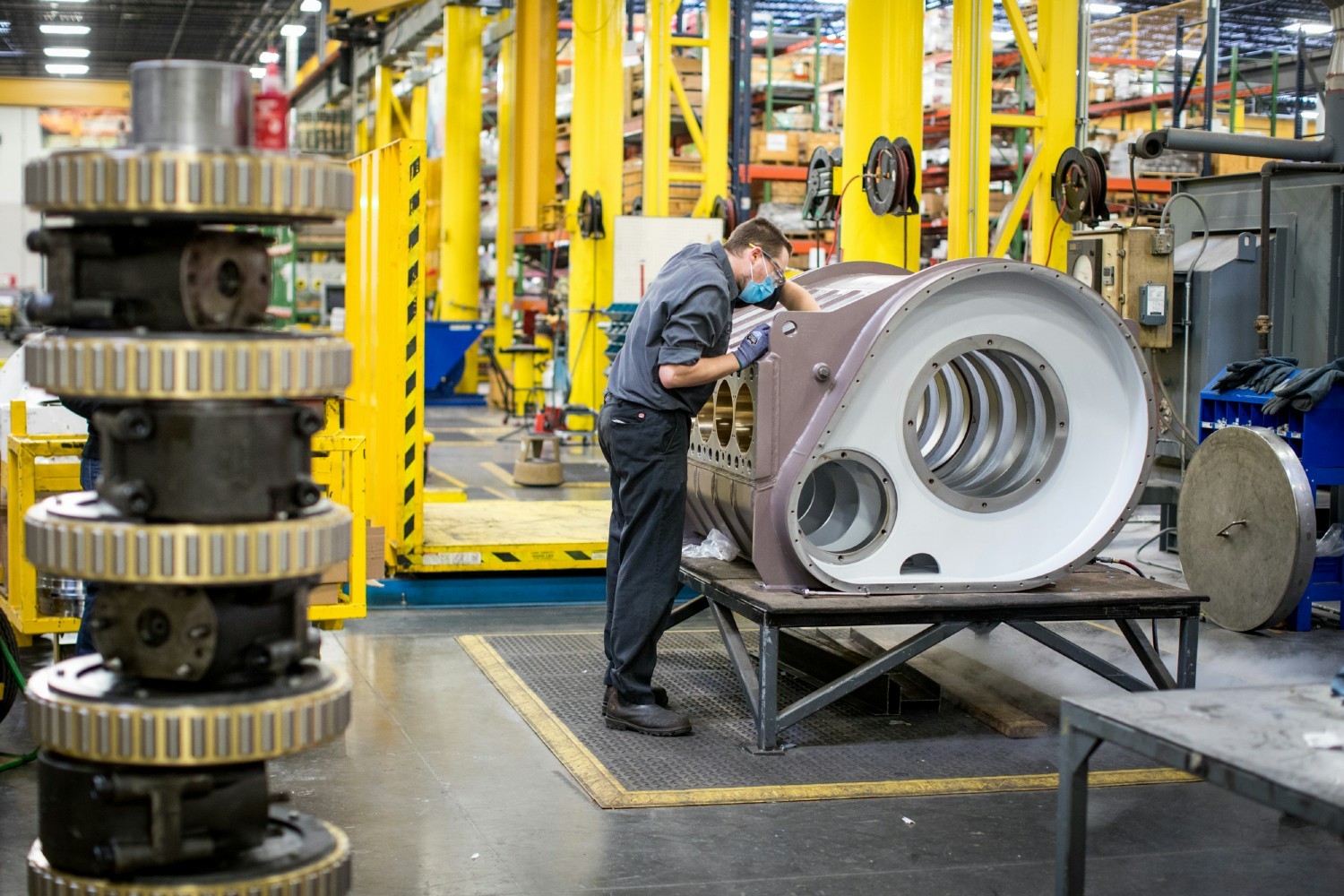 GD Energy Products employee performing a pump inspection. 