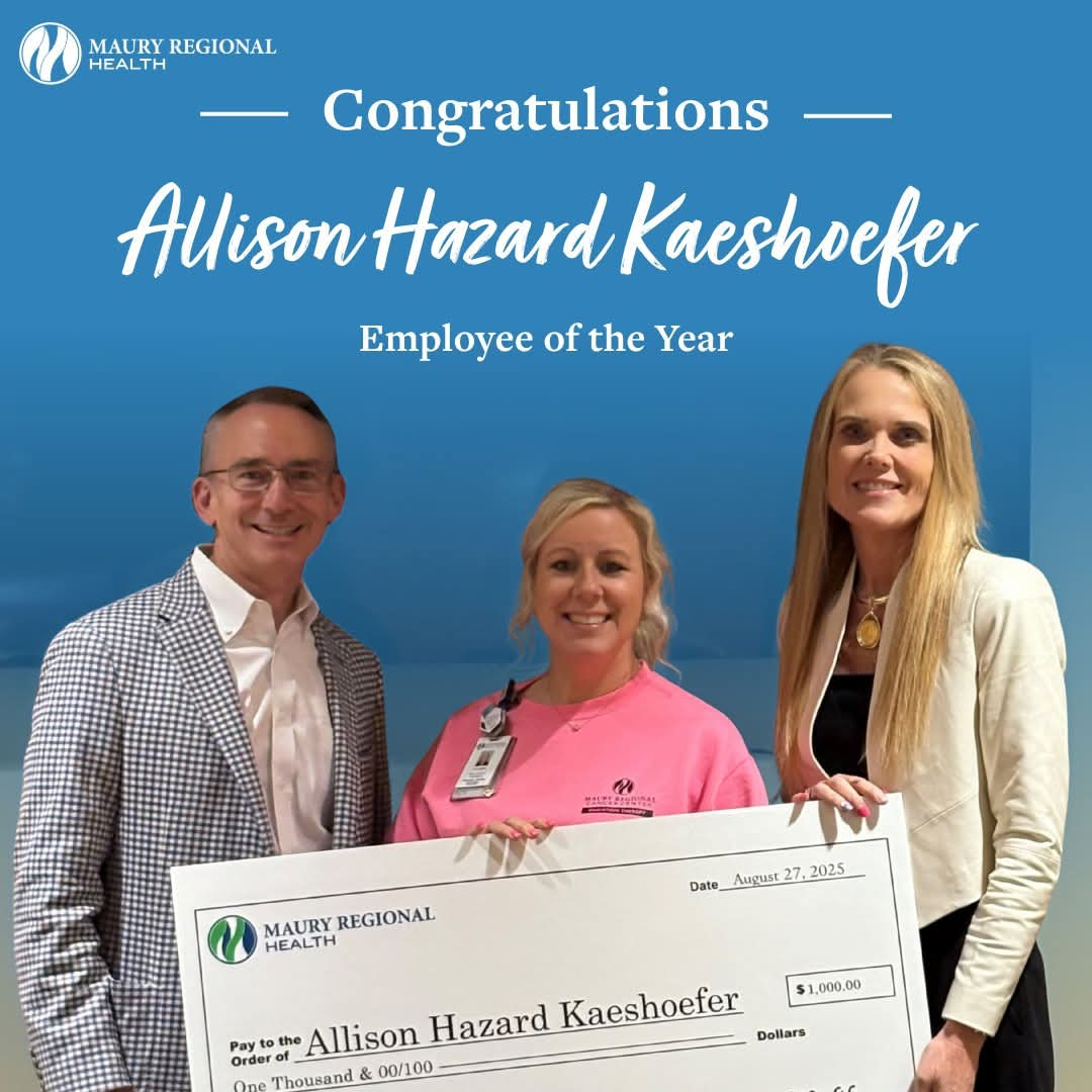 Celebrating our Employee of the Year with our CEO and Administrative Director of Radiology Services.