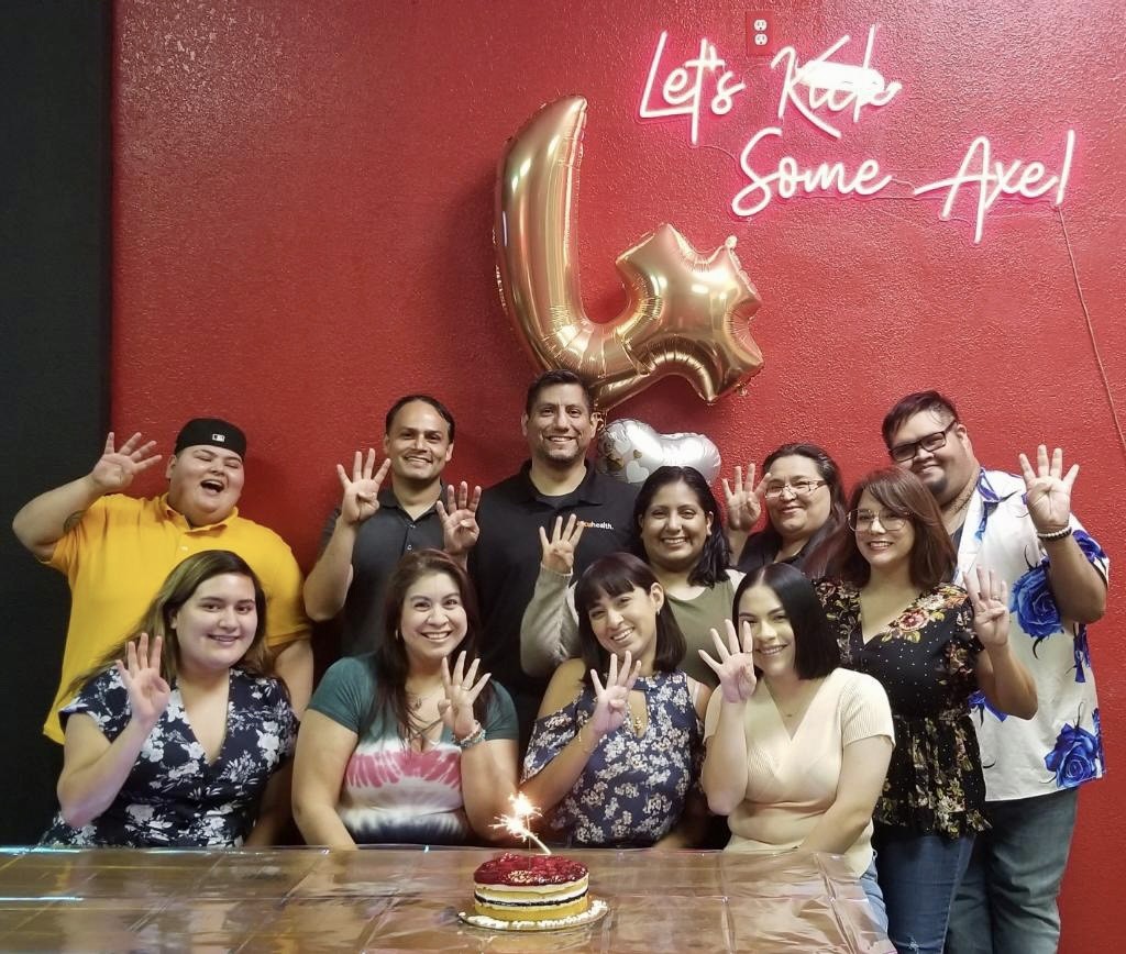 Celebrating Accuhealth's anniversary with staff from our office in Texas