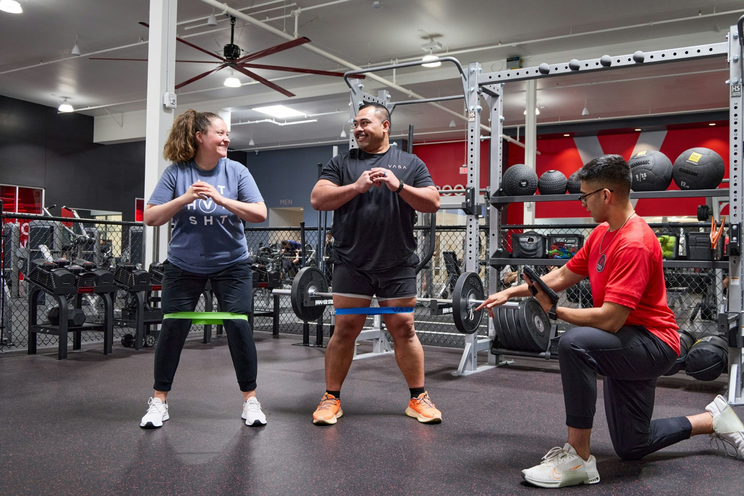 Team members at VASA’s front desk show off their muscles—and smiles—for the camera.