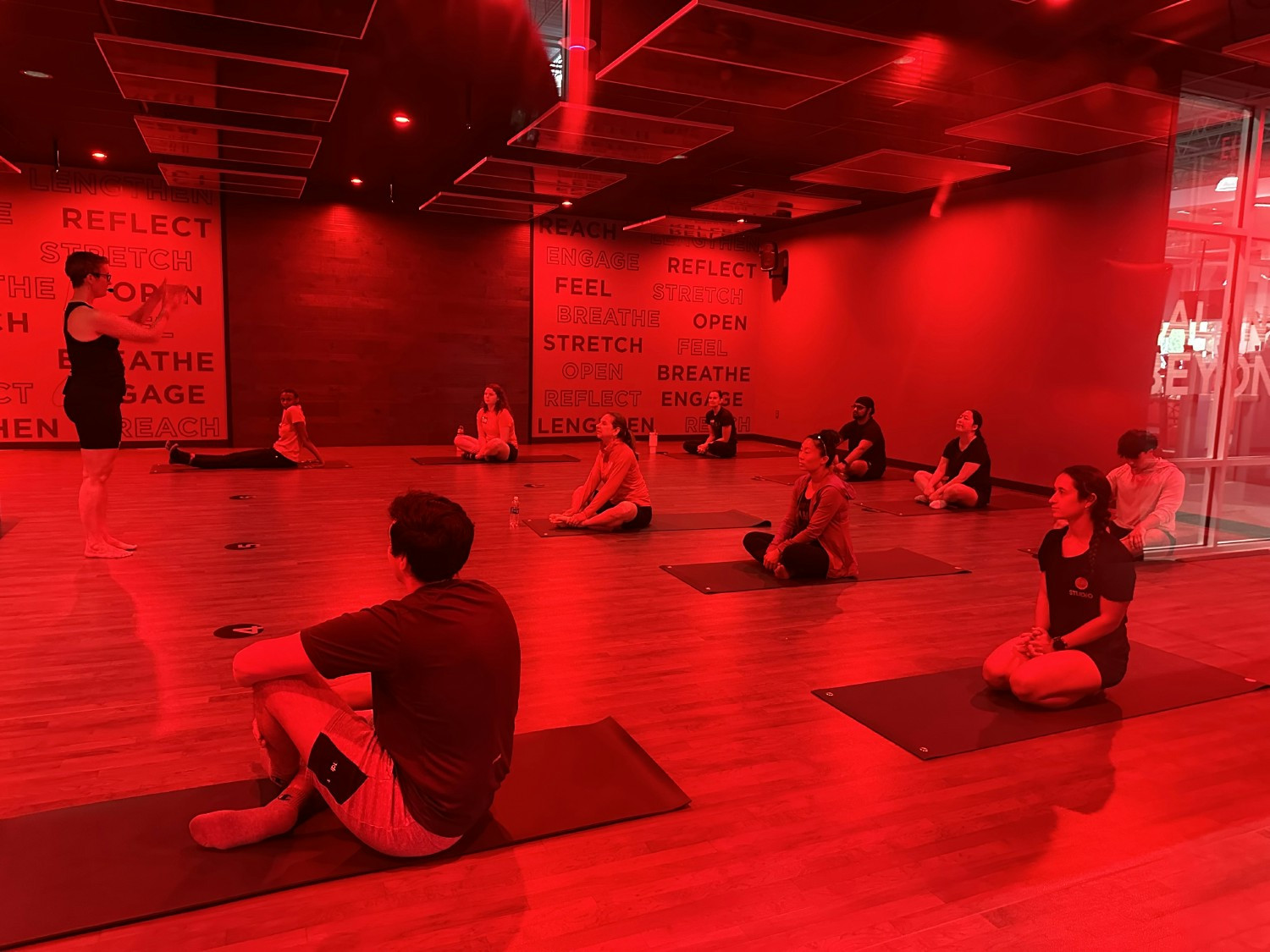 VASA team members enjoy STUDIO FLOW infrared yoga, a mind/body yoga experience featuring infrared panels.