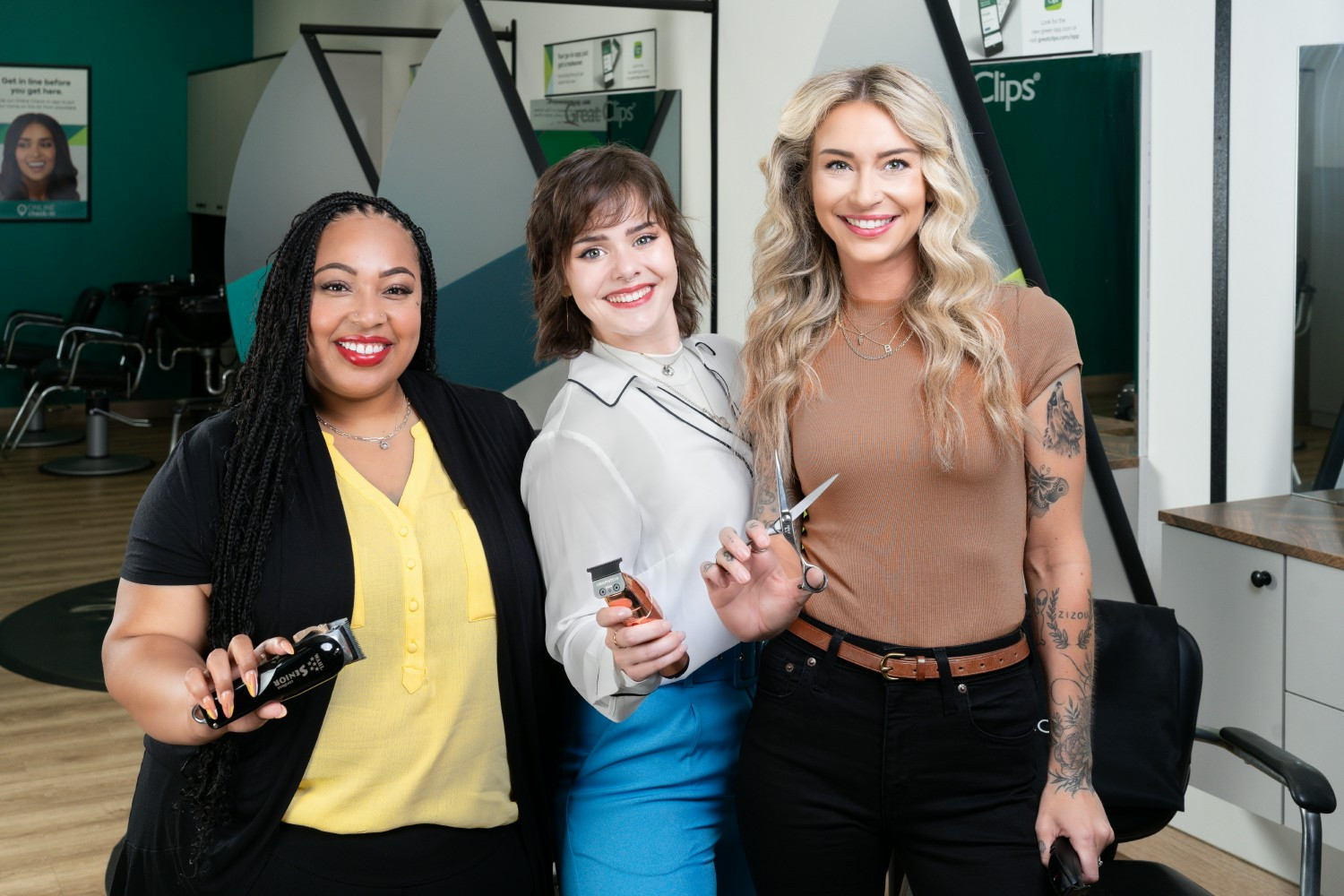 Three stylists posing