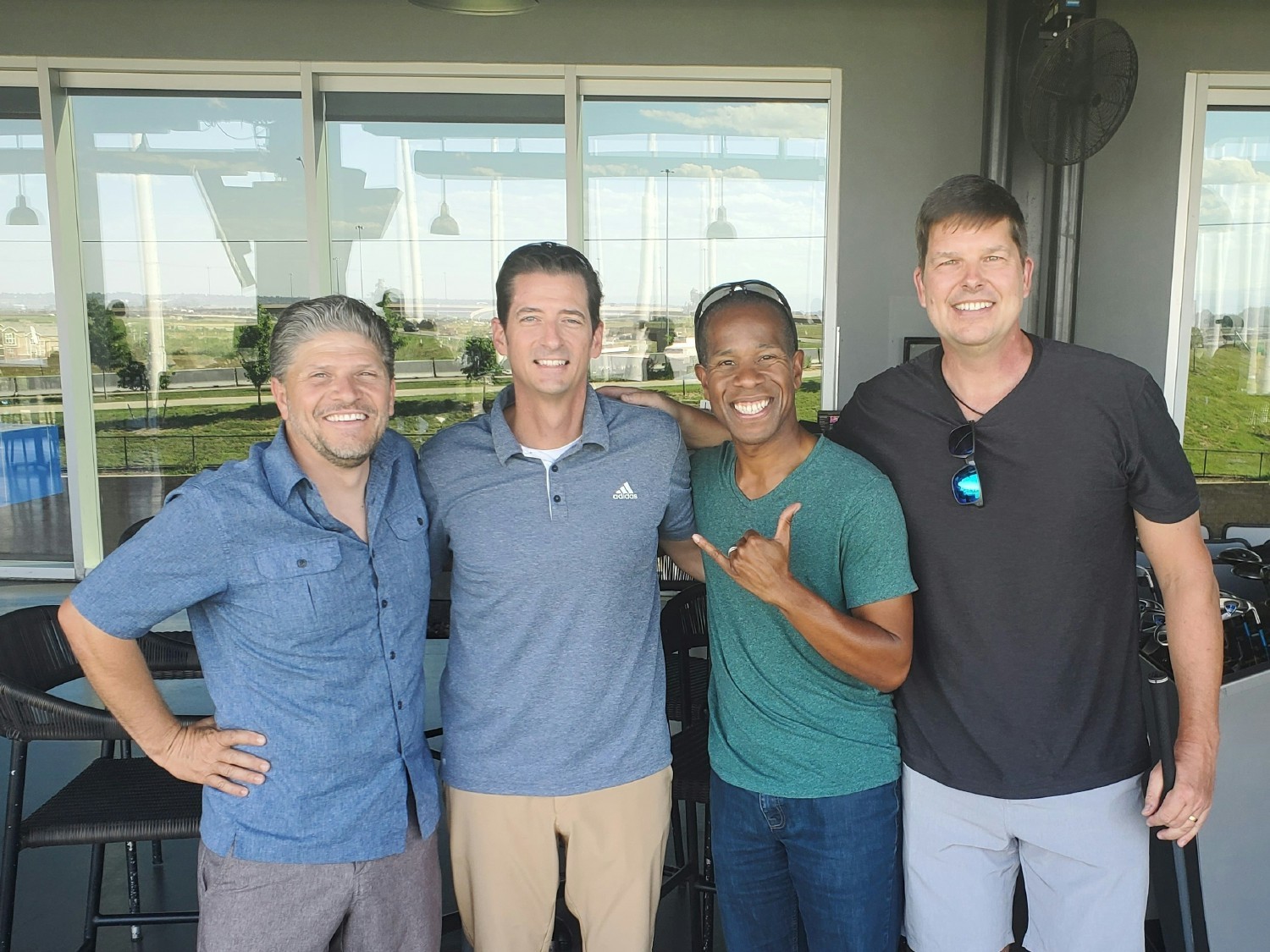 Enjoying our summer social at Top Golf!